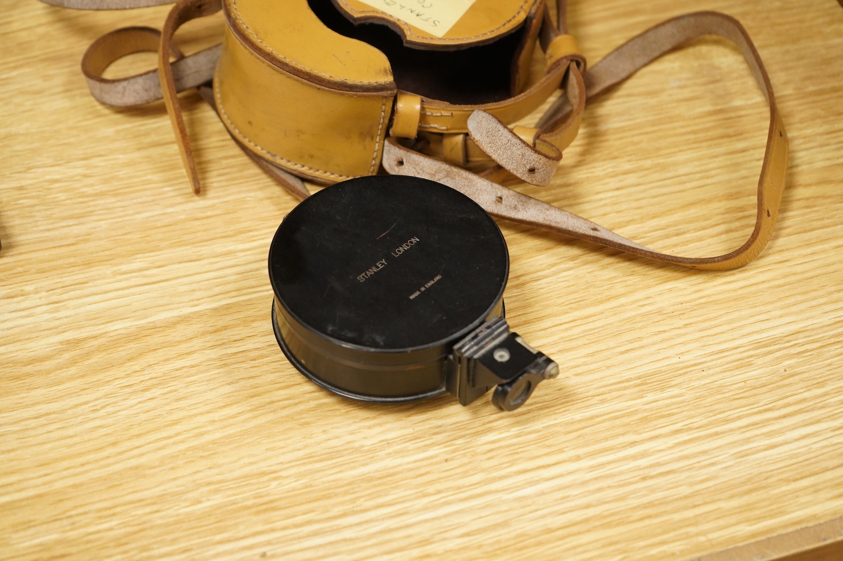 Four scientific instruments, consisting; a set of apothecaries steel balance scales, by Charles de Grave, 59, St. Martin’s le Grand…London; a set of three small drawing compasses, leather cased; a prismatic compass, by S